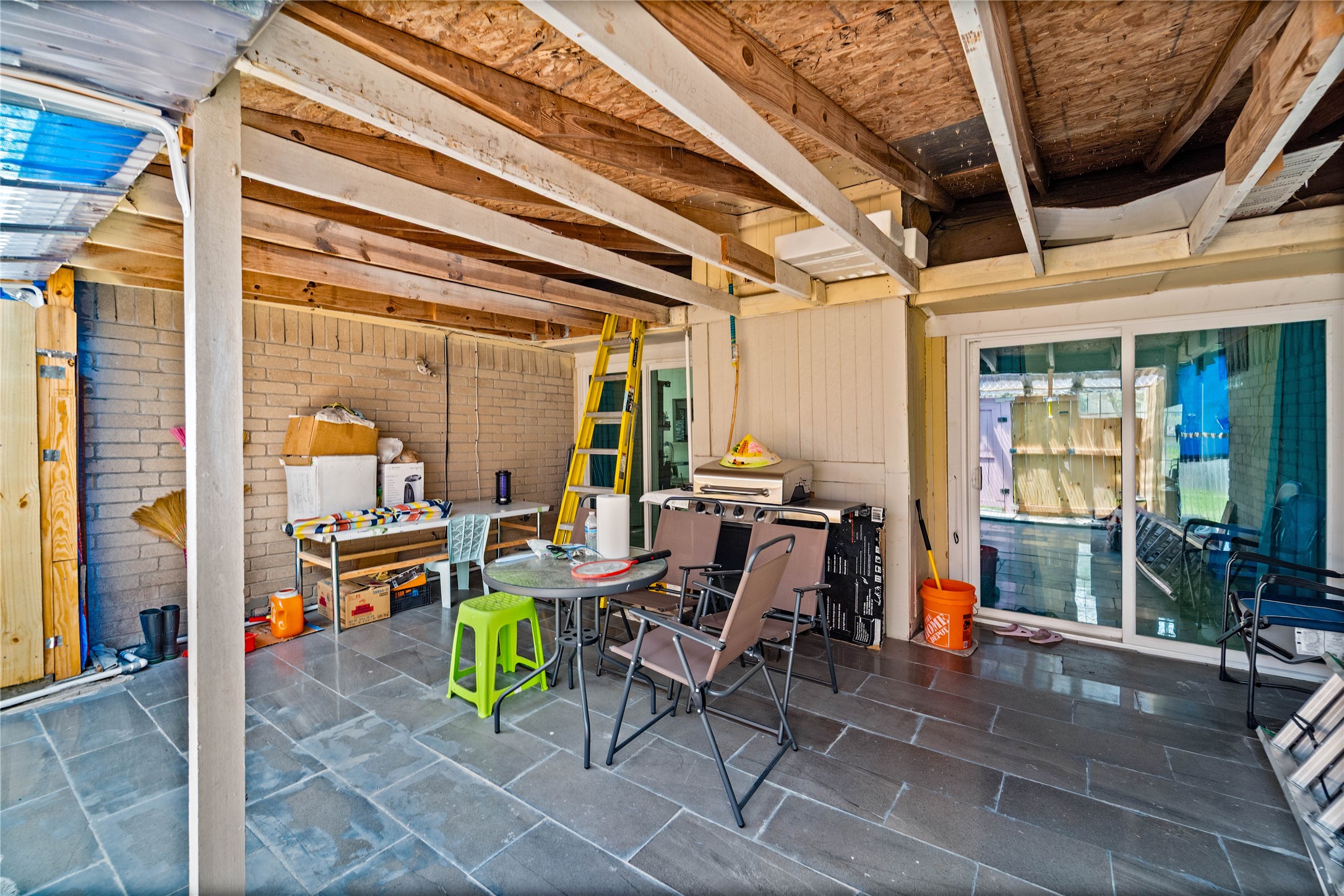 6331 Modesto Drive Houston, TX 77083 - Photo 29 of 31 a building outdoor space with patio furniture and potted plants