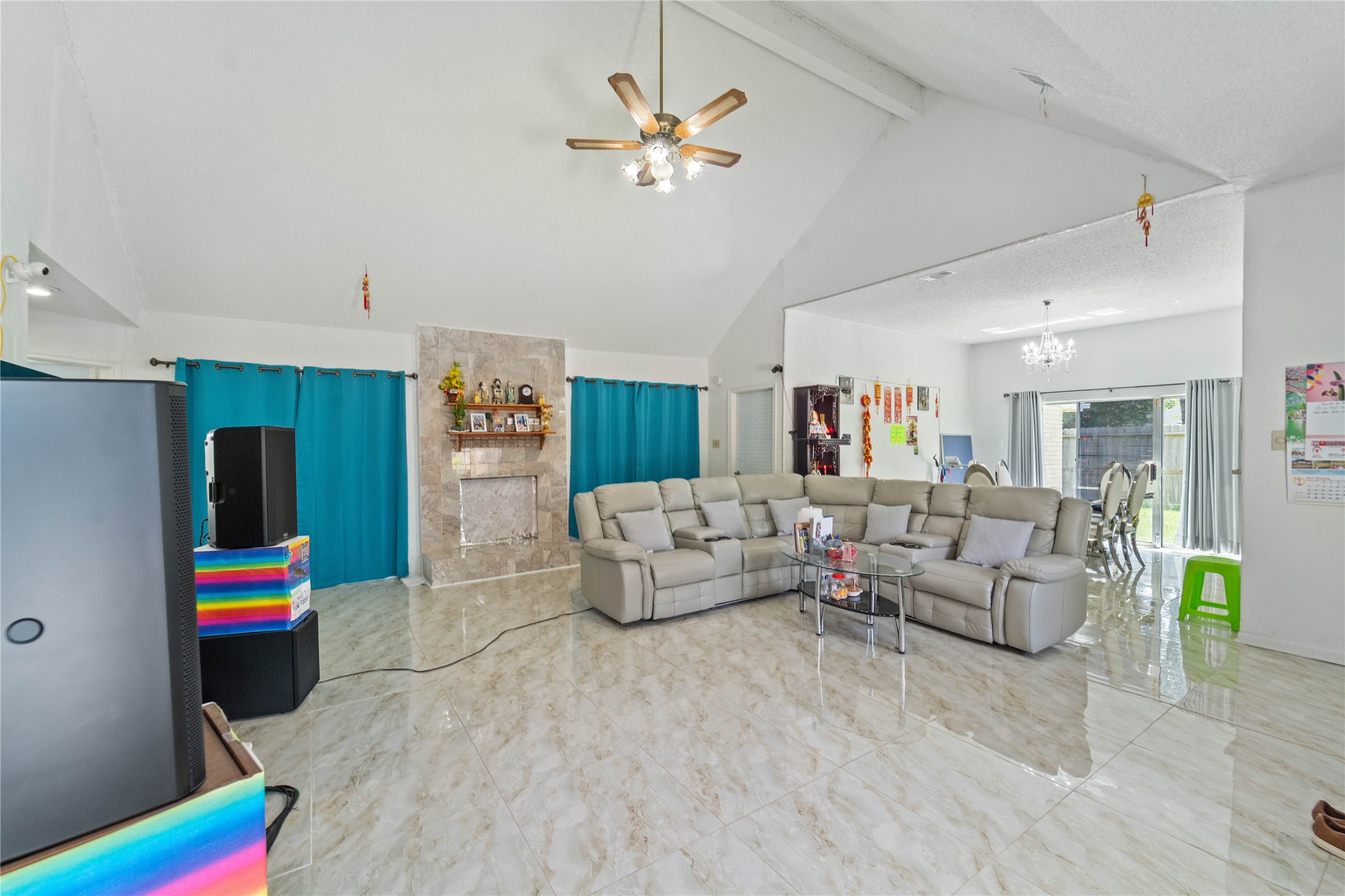 6331 Modesto Drive Houston, TX 77083 - Photo 6 of 31 a living room with furniture and a flat screen tv