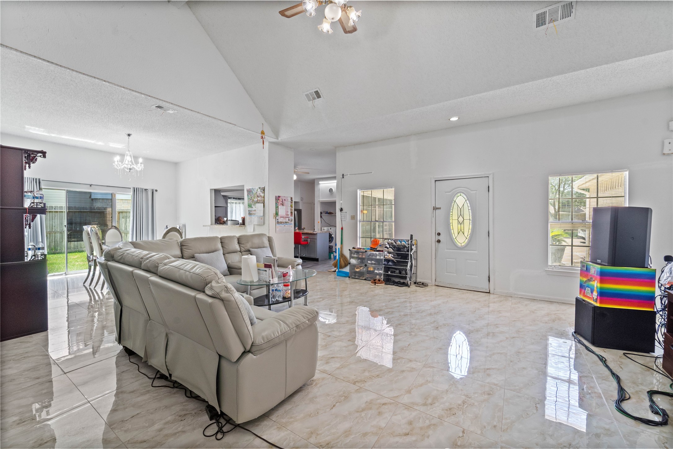 6331 Modesto Drive Houston, TX 77083 - Photo 8 of 31 a living room with furniture and a flat screen tv