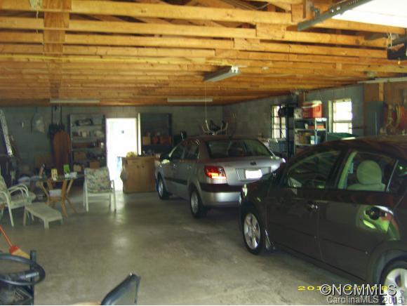 1105 Moody Farm Road Maggie Valley, NC 28751 - Photo 22 of 22 a view of a patio with table and chairs