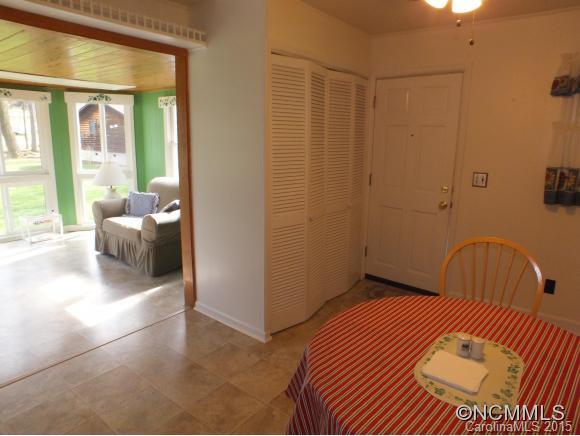 1105 Moody Farm Road Maggie Valley, NC 28751 - Photo 5 of 22 a bedroom with a bed and a couch