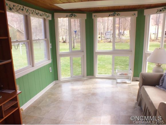 1105 Moody Farm Road Maggie Valley, NC 28751 - Photo 6 of 22 a view of an empty room with a window