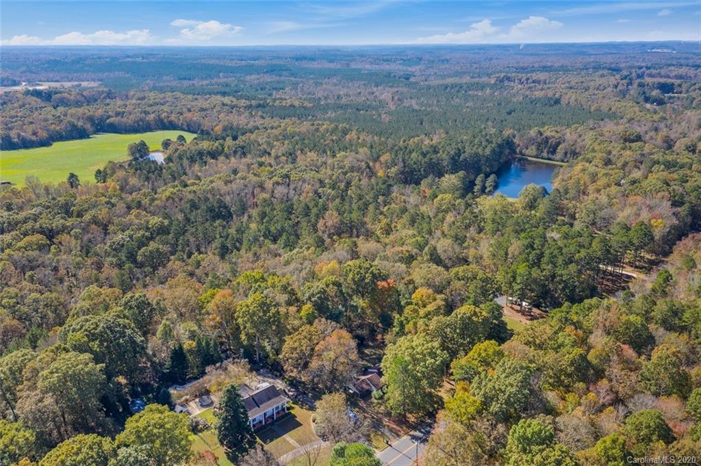 321 Okeewemee Star Road Star, NC 27356 - Photo 4 of 32 an aerial view of a houses with a yard