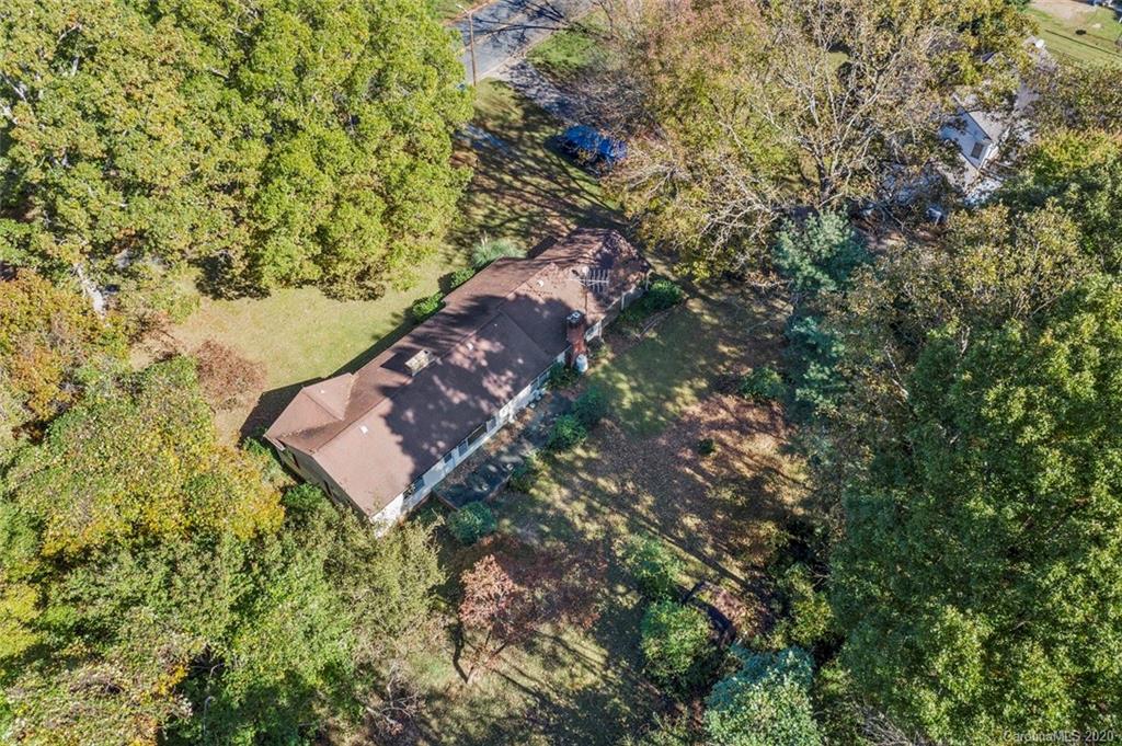 321 Okeewemee Star Road Star, NC 27356 - Photo 6 of 32 a view of a house with a yard