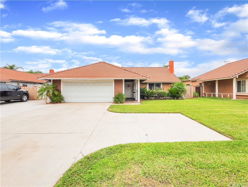 5241 Central Avenue Riverside, CA 92504 - Photo 1 of 1 a view of house with a garden