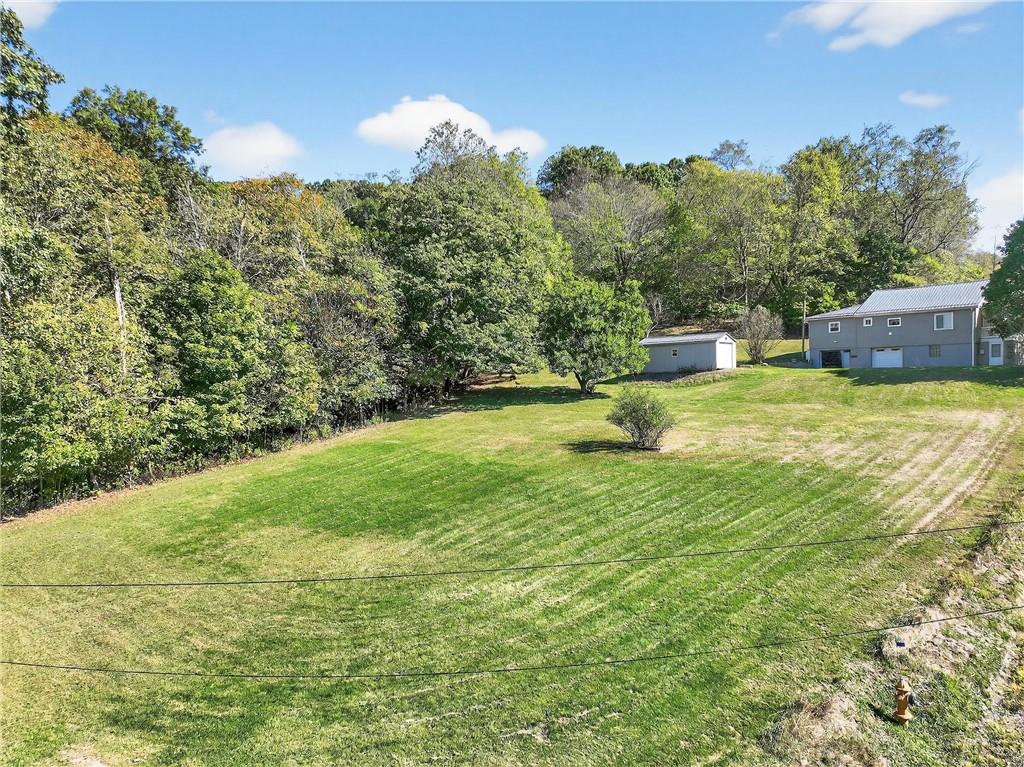 82 Phillips Road Burgettstown, PA 15021 - Photo 18 of 49 a view of a swimming pool with a yard
