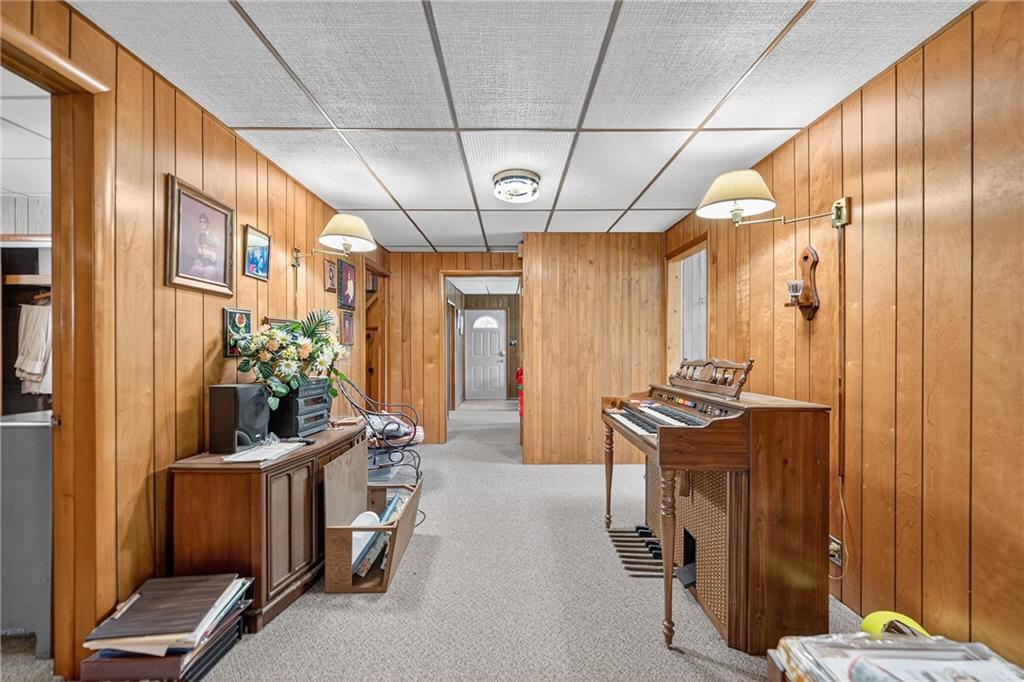 82 Phillips Road Burgettstown, PA 15021 - Photo 33 of 49 a view of a hallway with furniture and a window