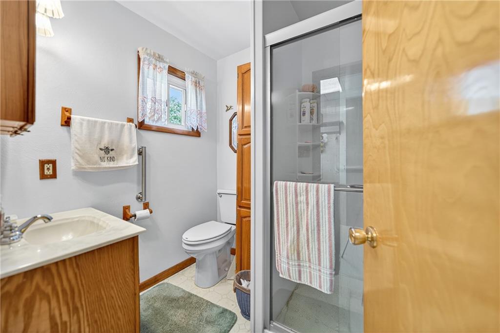 82 Phillips Road Burgettstown, PA 15021 - Photo 35 of 49 a bathroom with a sink toilet and shower