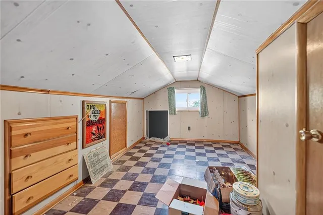 a view of a porch with wooden floor and outdoor space