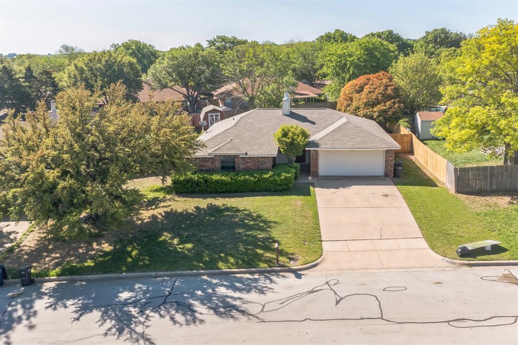 10125 Indian Mound Road Fort Worth, TX 76108 - Photo 1 of 1 a view of a yard with plants
