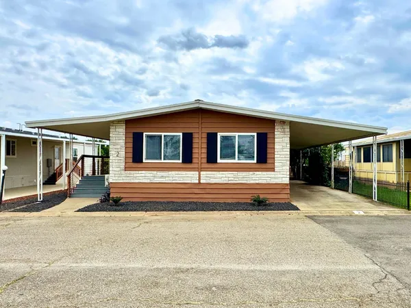 a view of a house with a patio