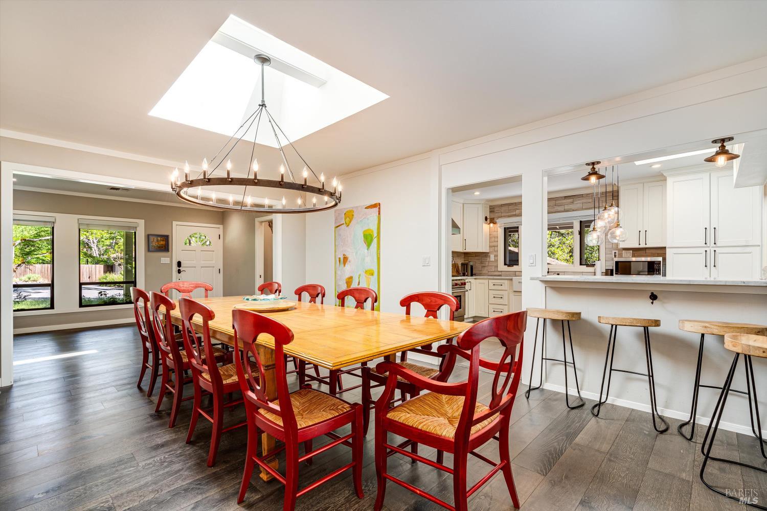 850 Conn Valley Road St. Helena, CA 94574 - Photo 17 of 79 a view of a dining room with furniture window and wooden floor