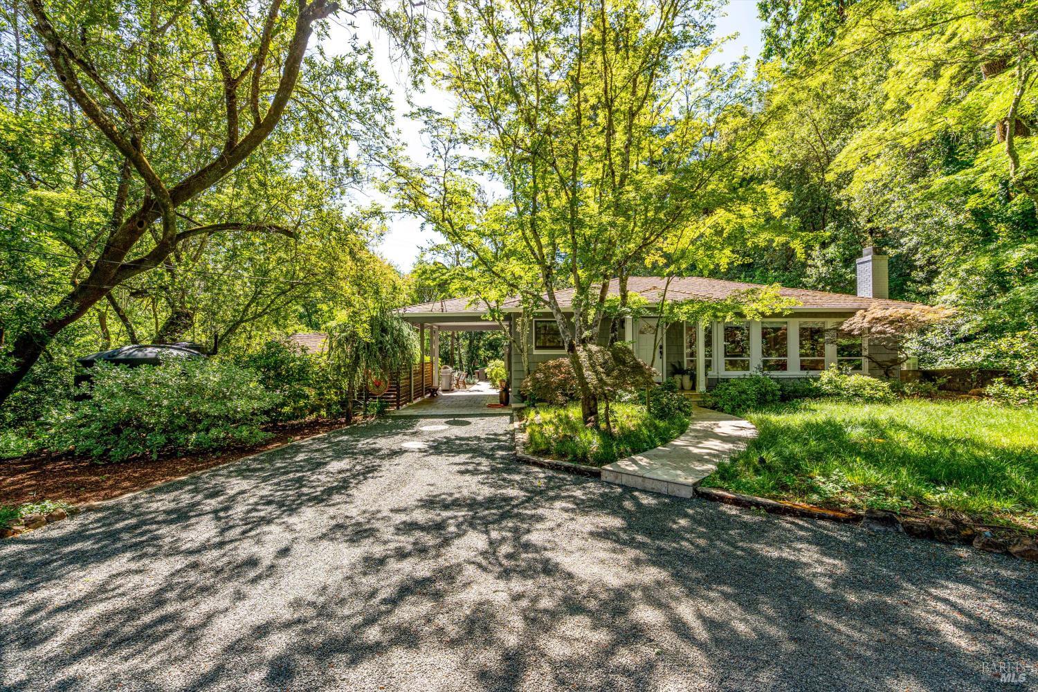 850 Conn Valley Road St. Helena, CA 94574 - Photo 2 of 79 a front view of a house with a yard