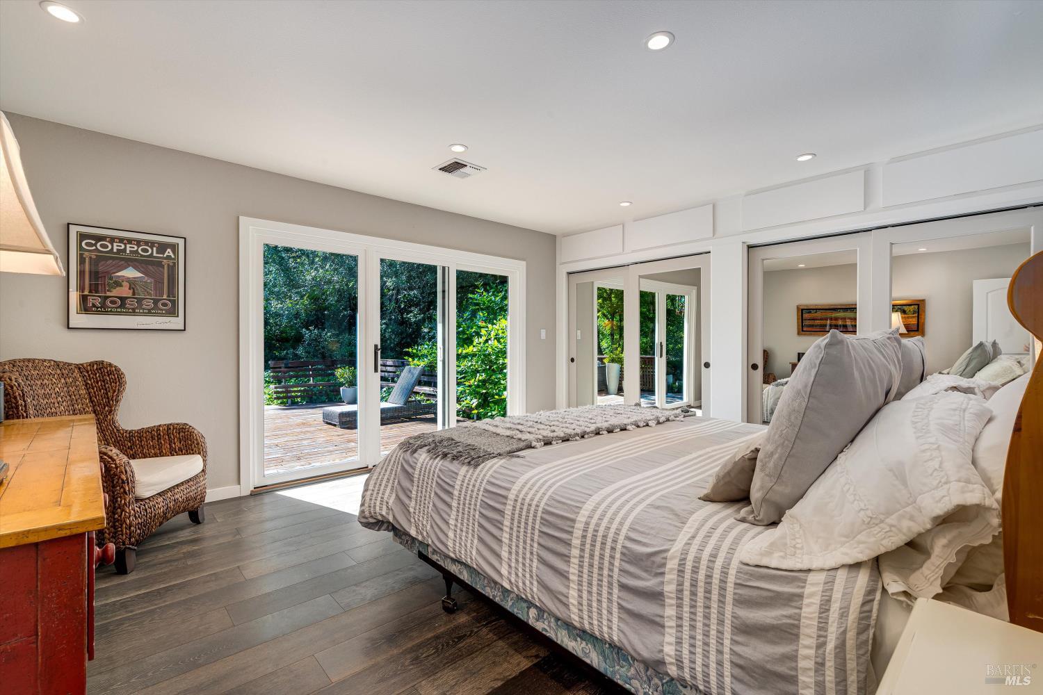 850 Conn Valley Road St. Helena, CA 94574 - Photo 23 of 79 a bed room with a bed and a chair