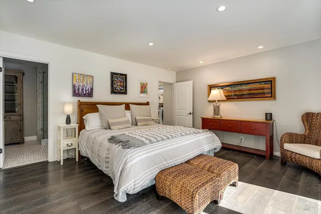 a bathroom with a sink a vanity and shower
