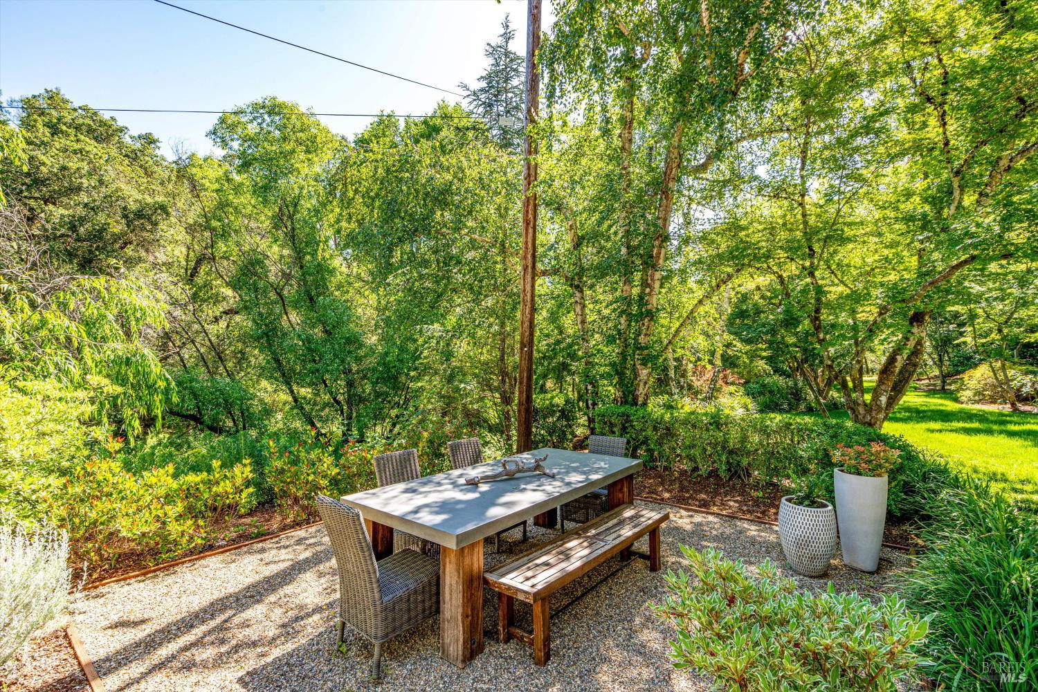 850 Conn Valley Road St. Helena, CA 94574 - Photo 48 of 79 a view of a backyard with sitting area