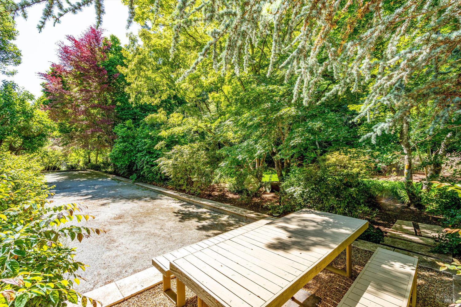 850 Conn Valley Road St. Helena, CA 94574 - Photo 62 of 79 a view of a yard with an outdoor space