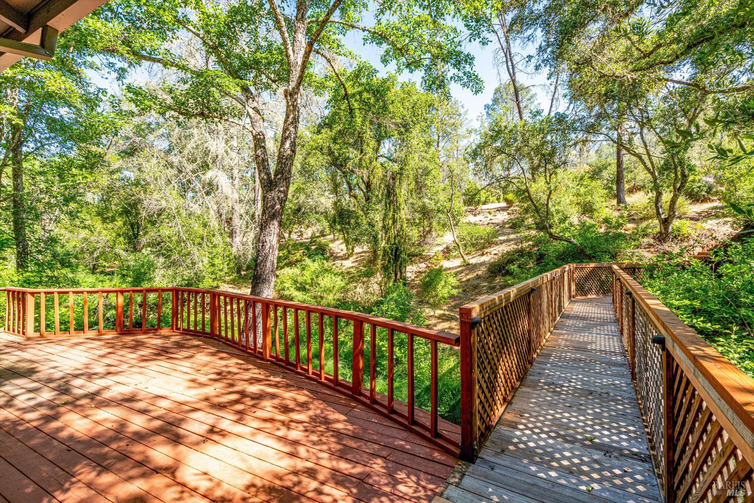 850 Conn Valley Road St. Helena, CA 94574 - Photo 70 of 79 a balcony with view of trees in front of it