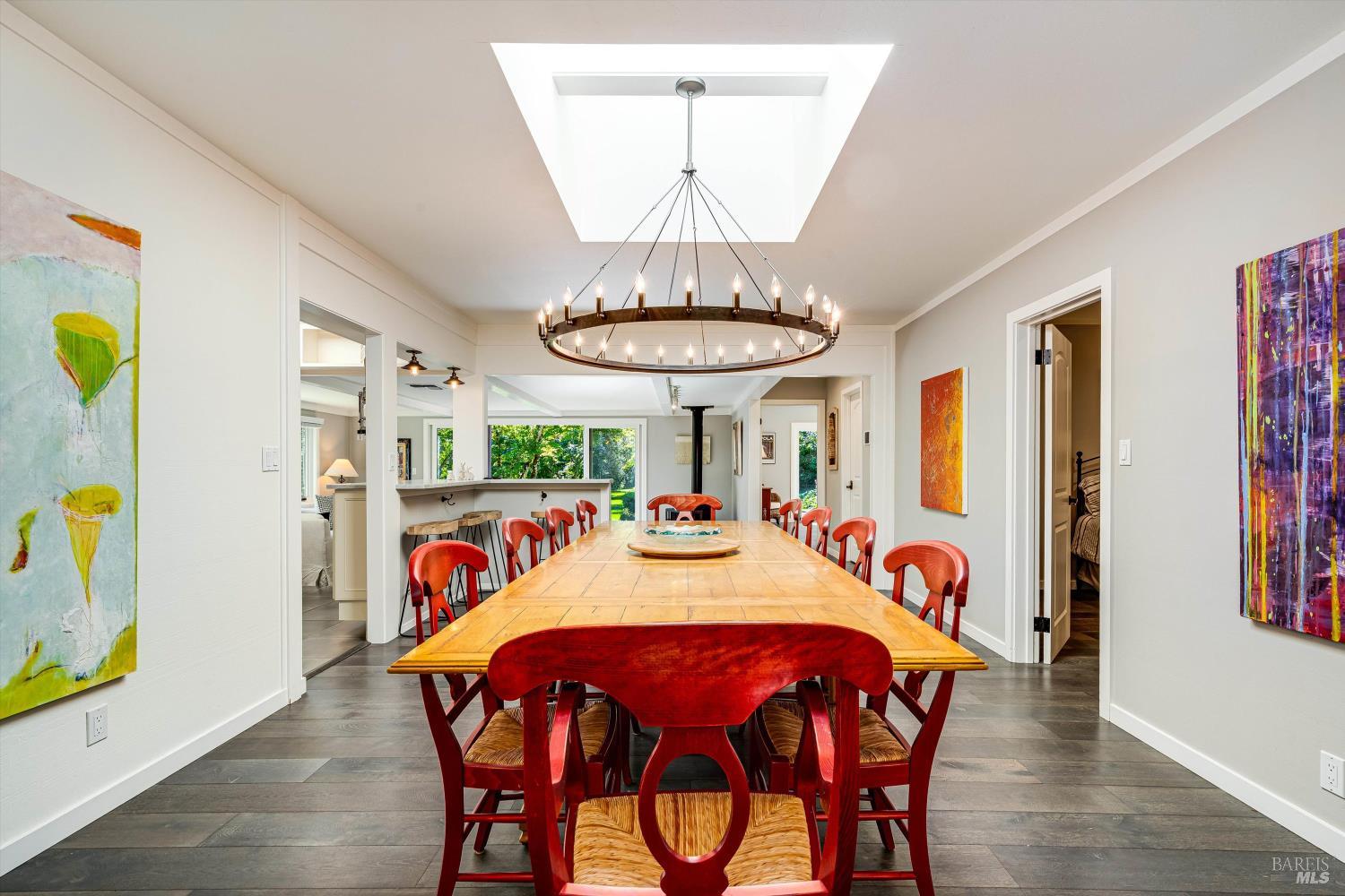 850 Conn Valley Road St. Helena, CA 94574 - Photo 9 of 79 a view of a dining room with furniture and wooden floor