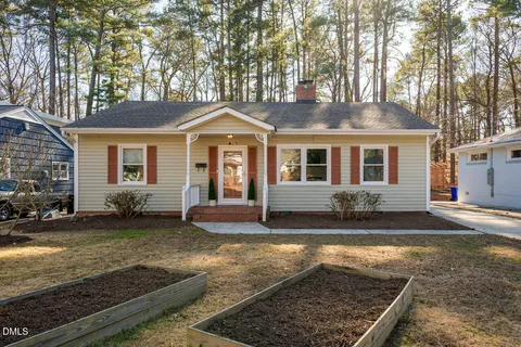 a front view of a house with yard