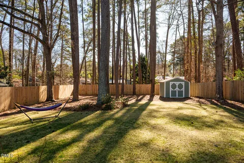 a view of a building with a yard