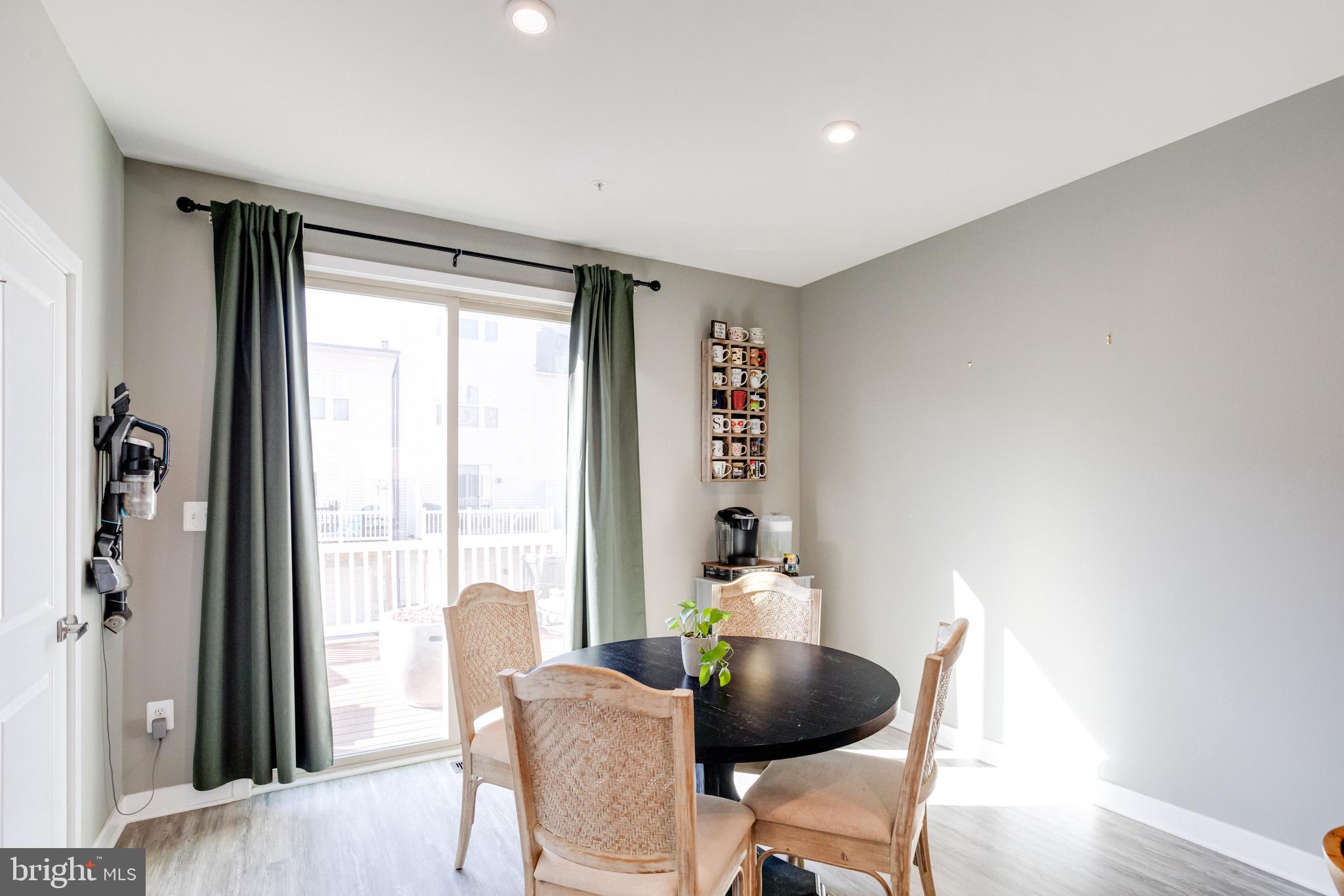 216 South Newkirk Street Baltimore, MD 21224 - Photo 11 of 35 Dining Room Leading to Trex Deck