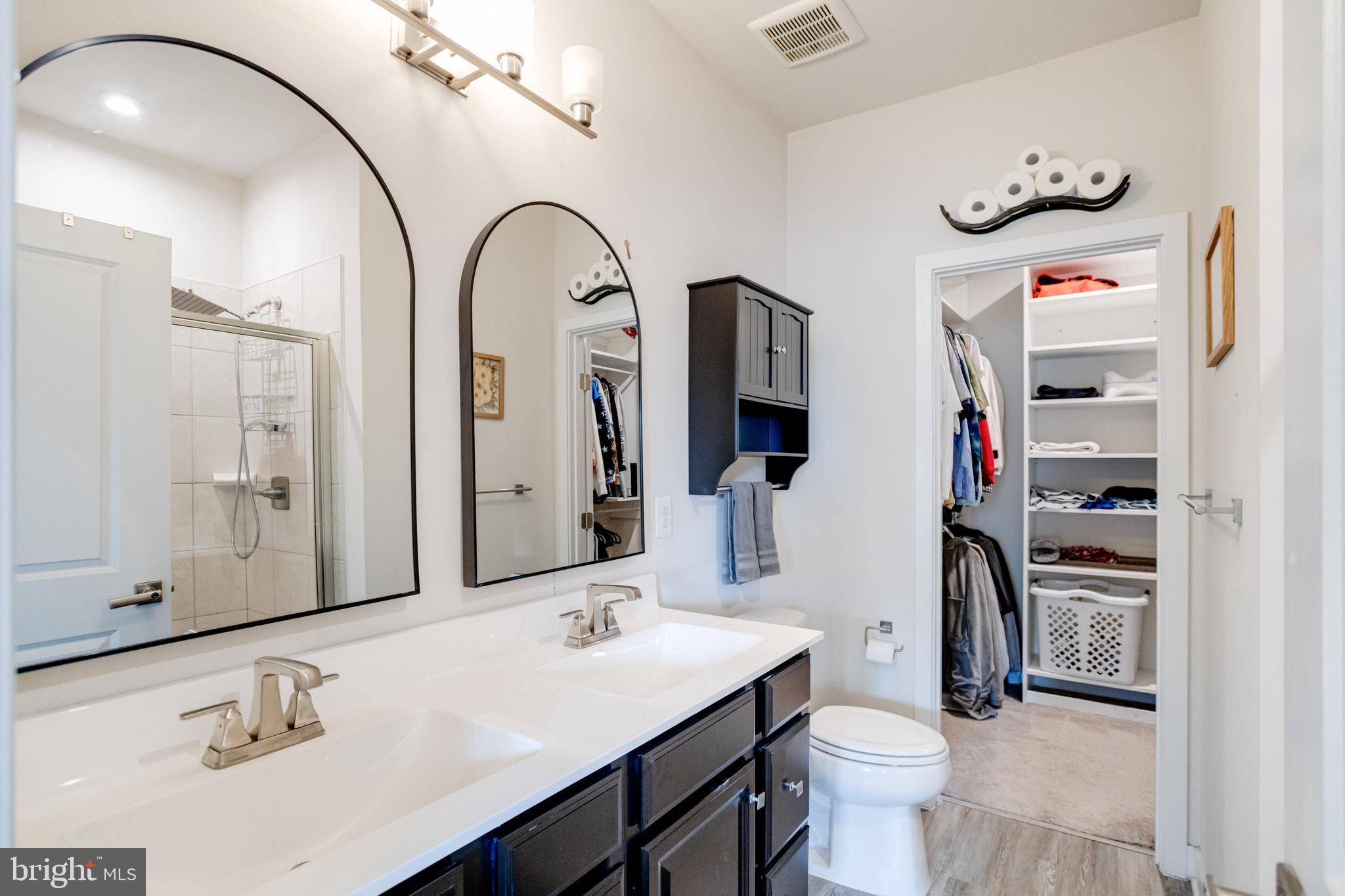 216 South Newkirk Street Baltimore, MD 21224 - Photo 21 of 35 Primary Bath Leading to Large Walk in Closet