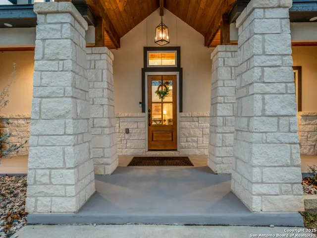 a view of a brick house with a yard