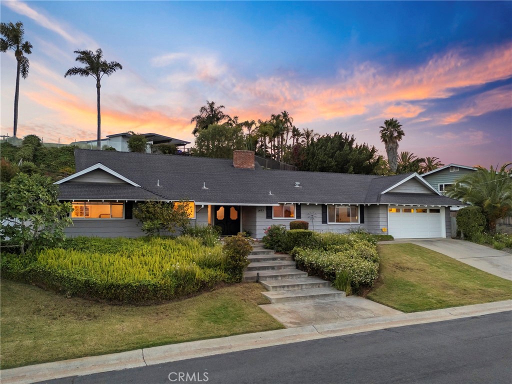 3495 Ridgecrest Drive Carlsbad, CA 92008 - Photo 4 of 42 front view of a house with a street