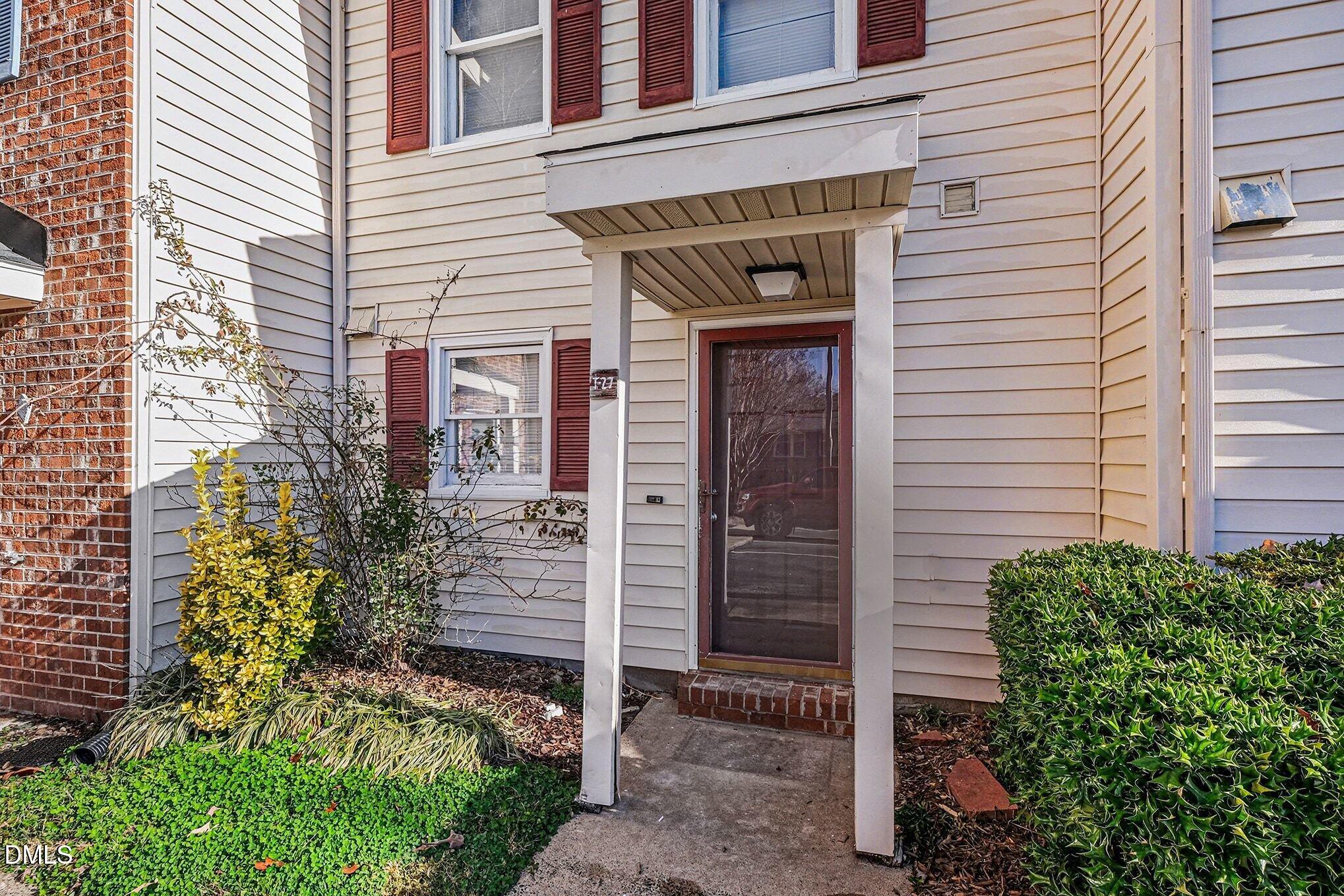 1509 Clermont Road, Unit T27 Durham, NC 27713 - Photo 3 of 26 a view of front door of house