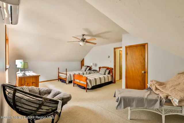 a bedroom with furniture and a couch