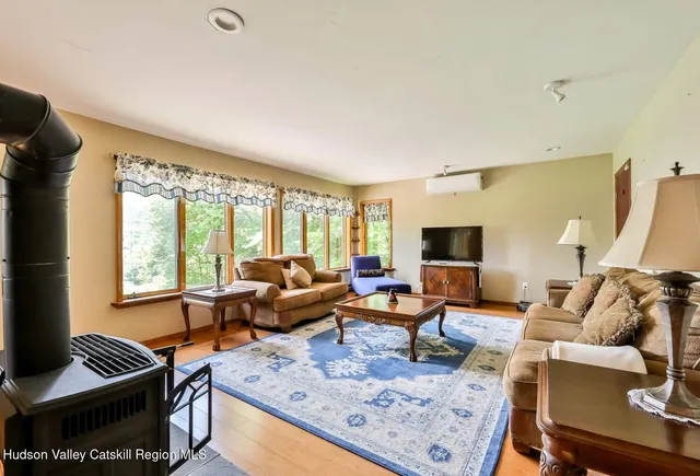 a living room with furniture and a window