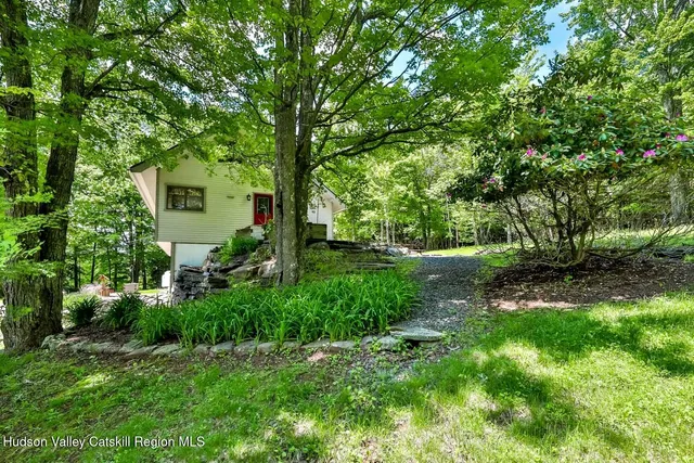 a view of a backyard with garden