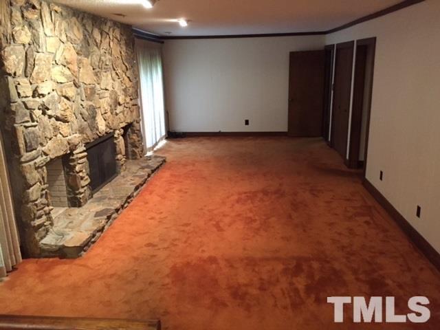 8908 Woodvine Court Raleigh, NC 27613 - Photo 4 of 8 a view of an empty room