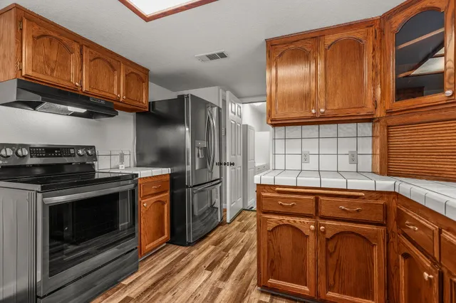 a view of a storage & utility room with washer and dryer