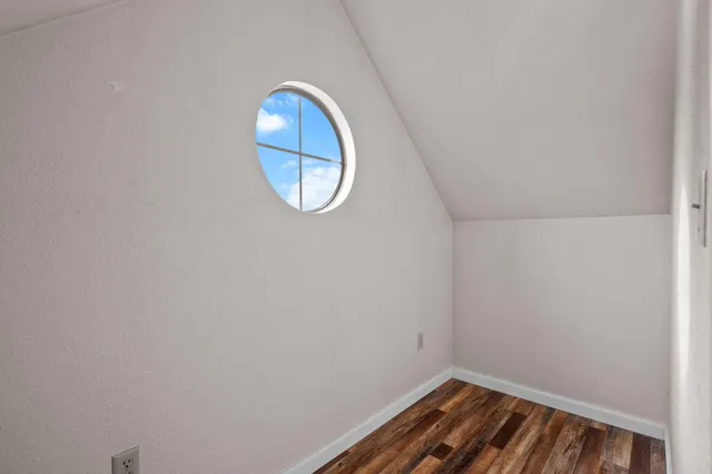 a view of yard with swimming pool and green space