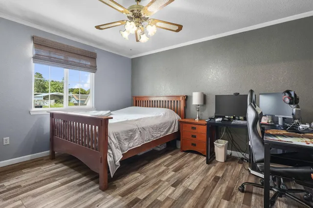 a house view with a sitting space and garden