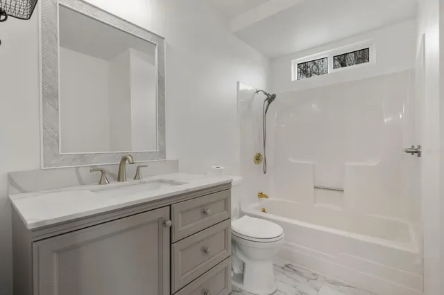 a view of a house with a garage