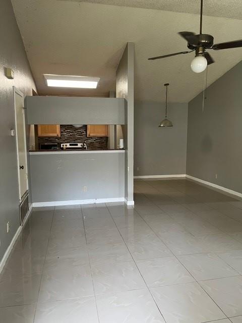 339 Fantail Loop, Unit B Austin, TX 78734 - Photo 3 of 13 a view of a livingroom with a ceiling fan