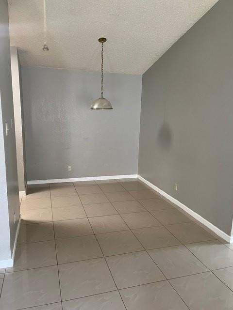 339 Fantail Loop, Unit B Austin, TX 78734 - Photo 4 of 13 a view of an empty room with a window