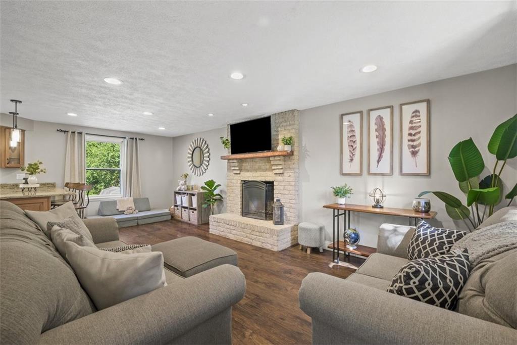 229 Lakeside Drive McKees Rocks, PA 15136 - Photo 13 of 35 a living room with furniture fireplace and a flat screen tv
