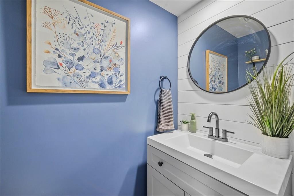 229 Lakeside Drive McKees Rocks, PA 15136 - Photo 17 of 35 a bathroom with a sink and a mirror