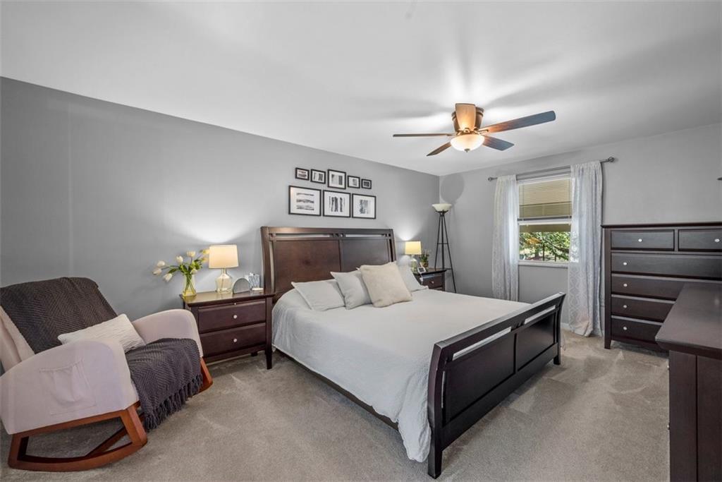 229 Lakeside Drive McKees Rocks, PA 15136 - Photo 18 of 35 a bedroom with a bed and a couch