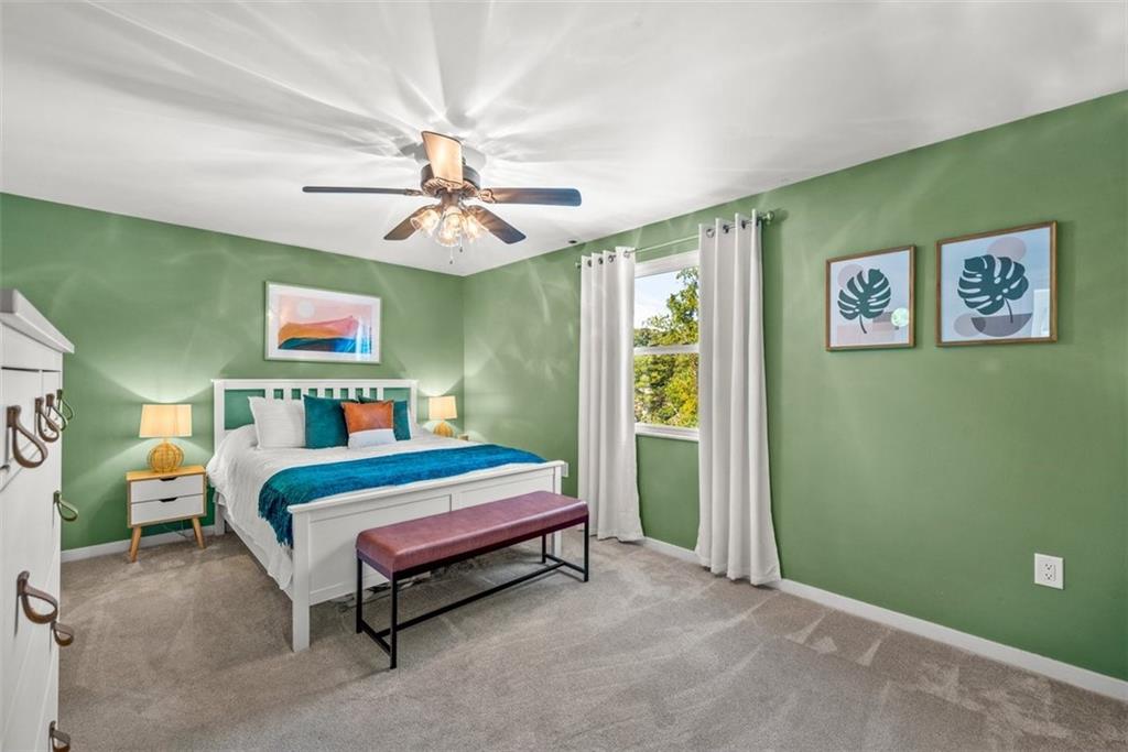 229 Lakeside Drive McKees Rocks, PA 15136 - Photo 22 of 35 a bed room with a bed and a chandelier