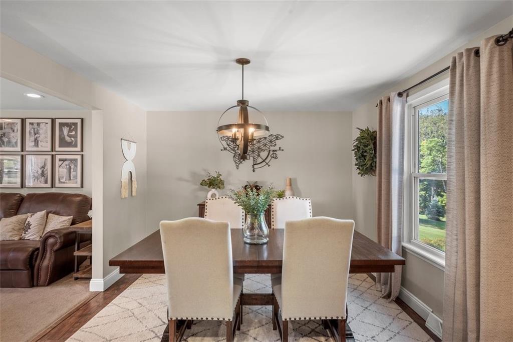 229 Lakeside Drive McKees Rocks, PA 15136 - Photo 6 of 35 a view of a dining room with furniture window and outside view