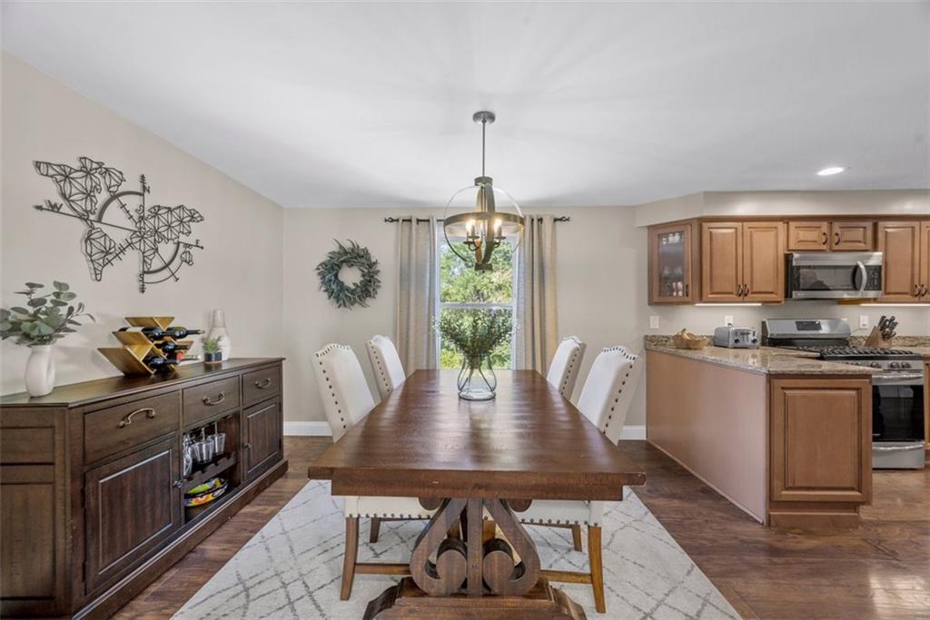229 Lakeside Drive McKees Rocks, PA 15136 - Photo 7 of 35 a view of a dining room with furniture window and outside view