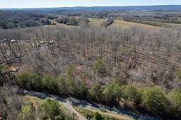 0 Craig Lane Decatur, TN 37322 - Photo 4 of 4 a view of a lake with a forest