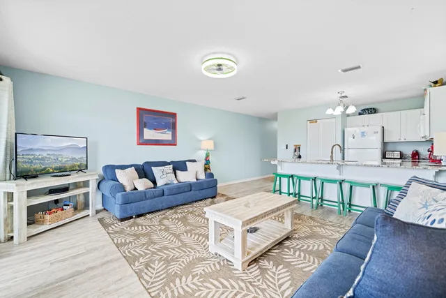 a living room with furniture and a couch