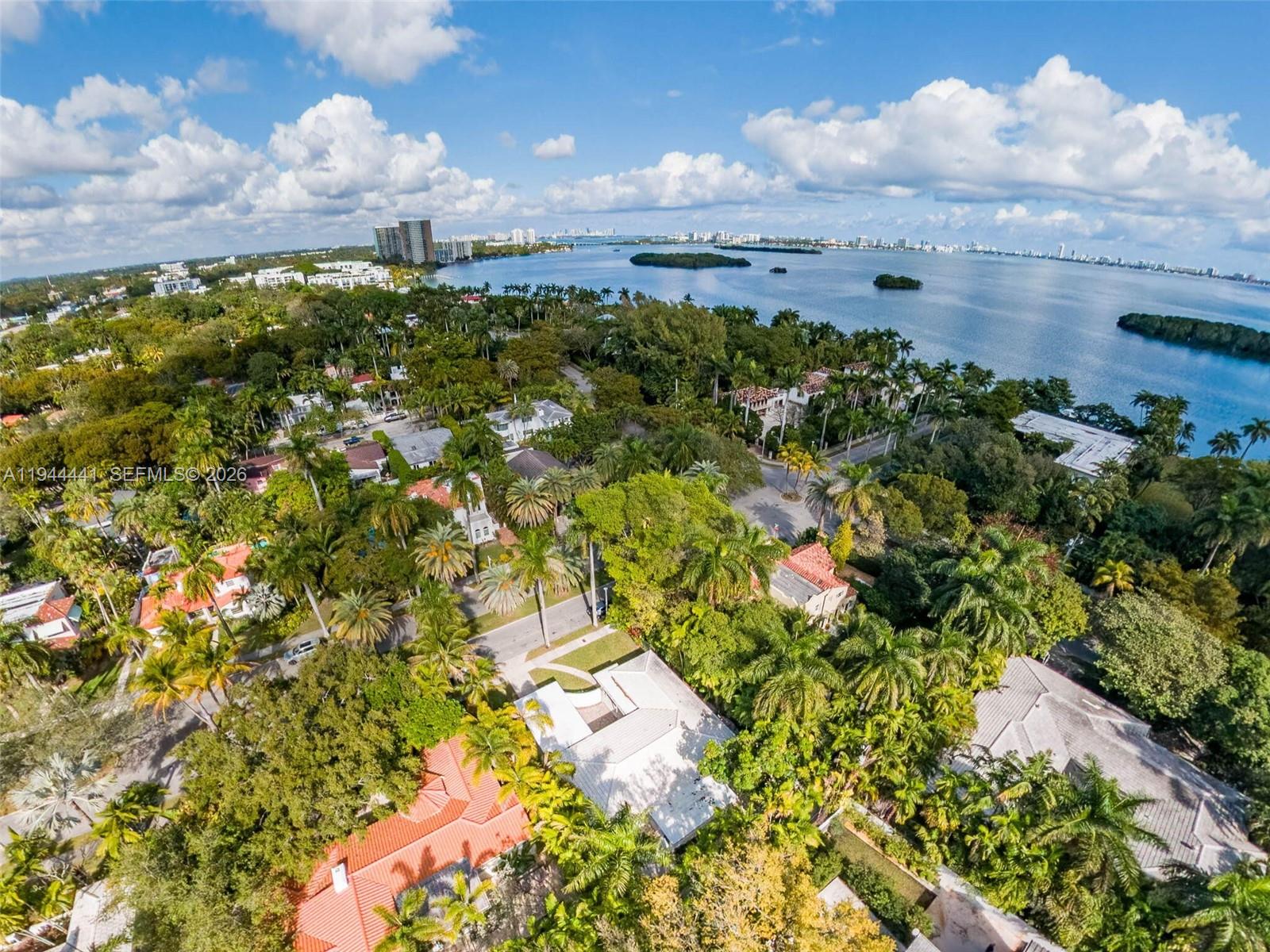 680 Northeast 57th Street Miami, FL 33137 - Photo 2 of 42 a view of a bunch of trees and houses