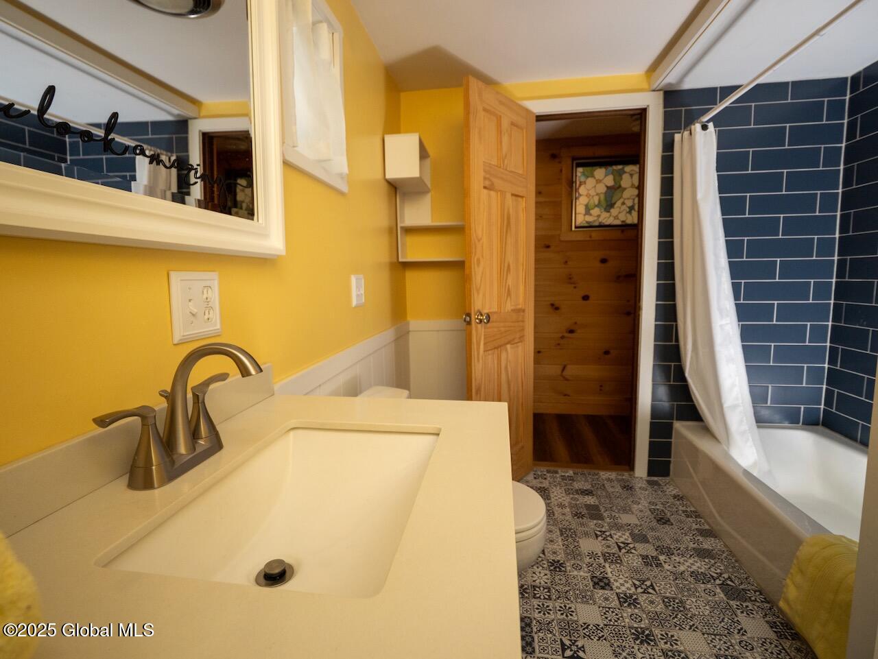 838 South Shore Road Edinburg, NY 12134 - Photo 17 of 68 14_yellow bath from sink